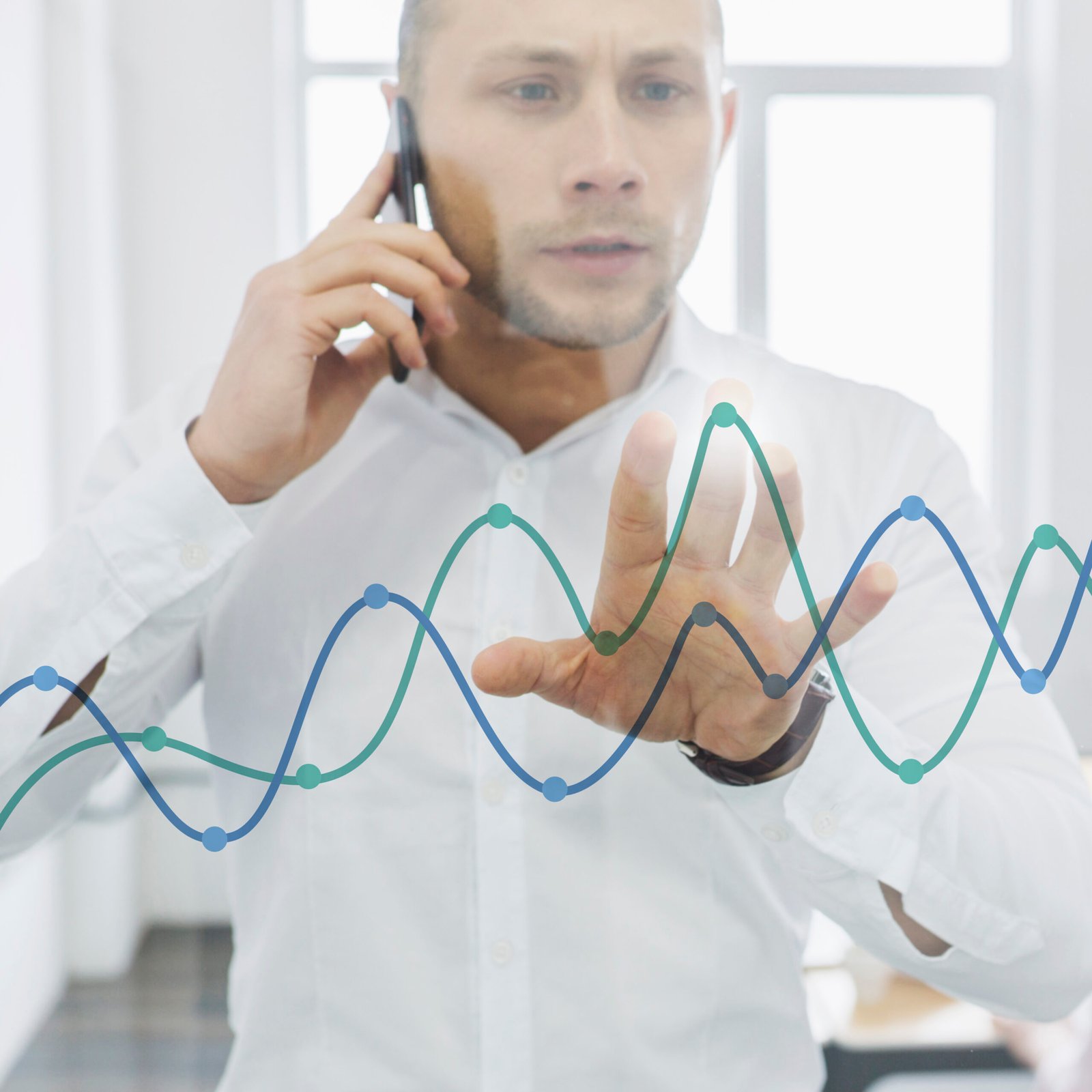 businessman-doing-phone-call-looking-charts (1) businessman-doing-phone-call-looking-charts (1)
