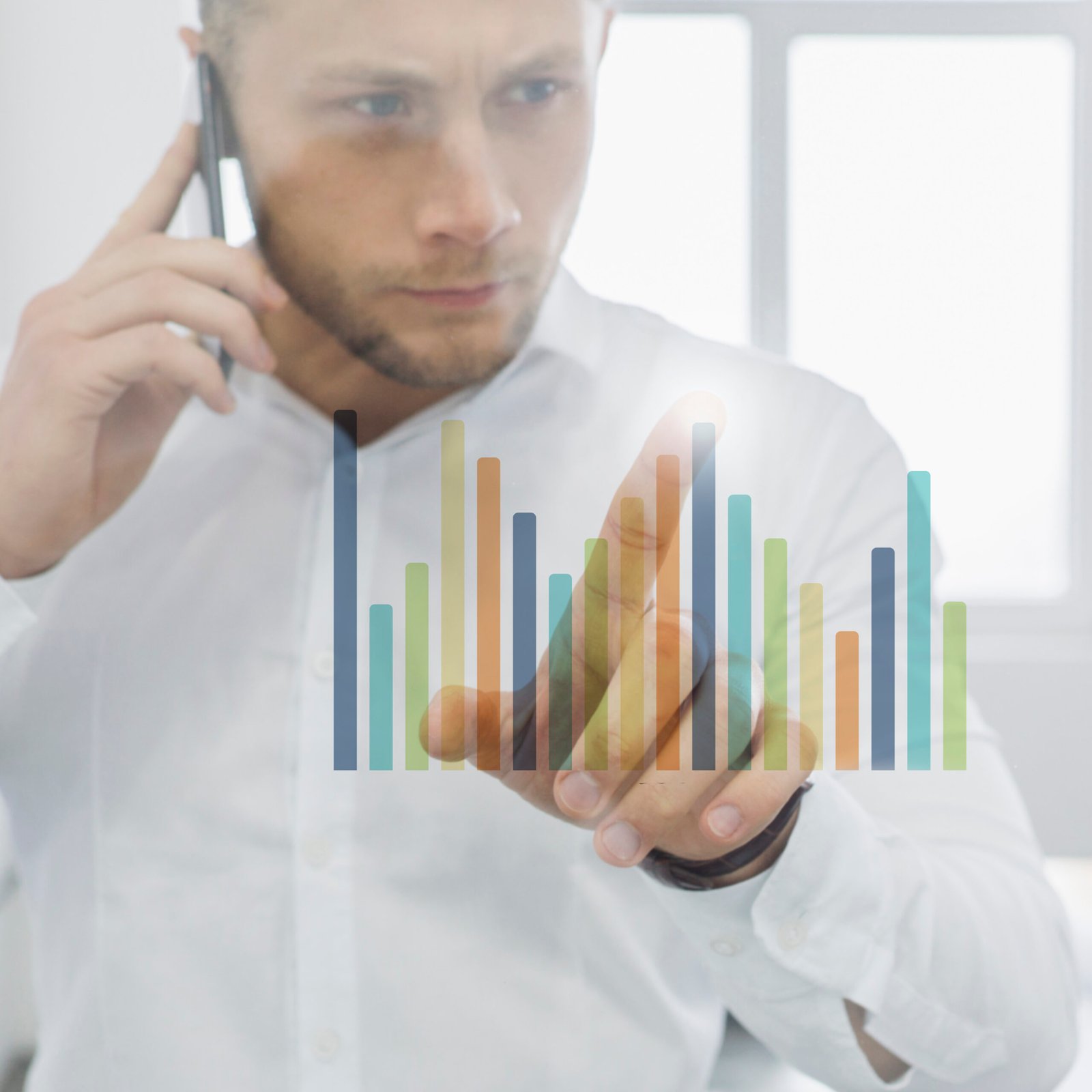 businessman-doing-phone-call-looking-charts businessman-doing-phone-call-looking-charts