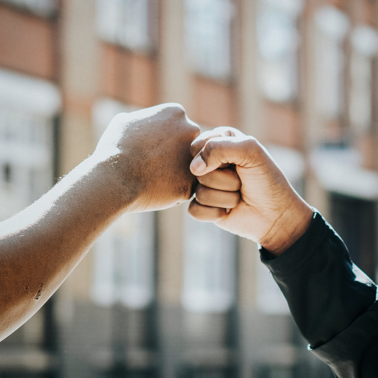 Fitness partners doing a fist bump Fitness partners doing a fist bump